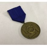 A German WWII SS long service and good conduct 8 year medal.