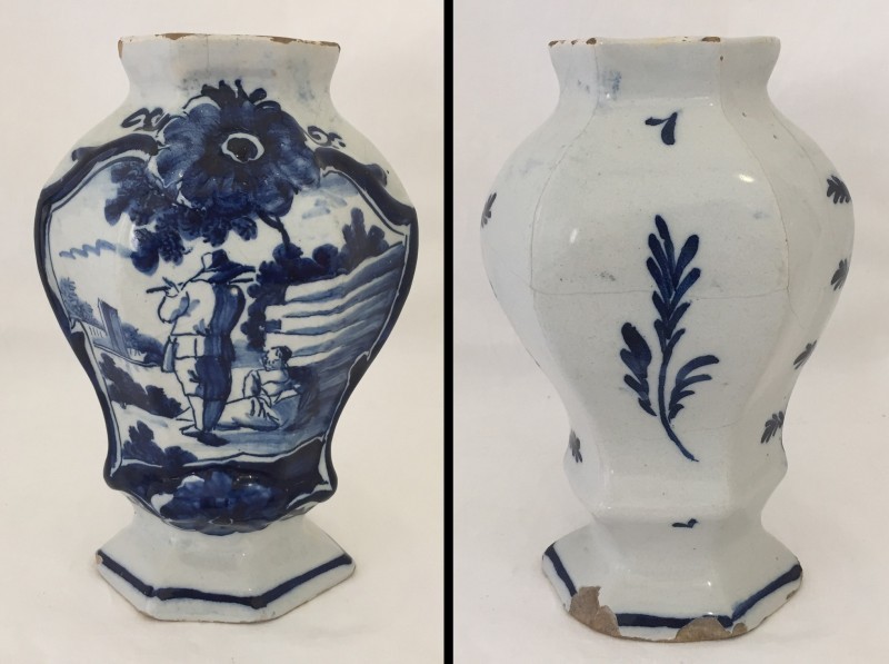 An 18th century Dutch Delft vase, 3 Bells factory with figural decoration.