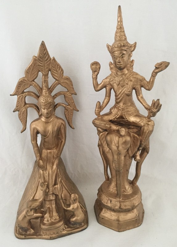 Two oriental deity metal figurines.