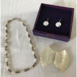 2 items of costume jewellery set with fresh water pearls together with a vintage glass belt buckle.