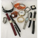 A tray of modern women's watches, straps and watch parts.