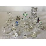 A collection of small crystal animal figures to include Swarovski.