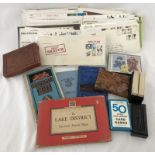 A large collection of first day covers, vintage card games and tourist maps.