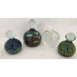 3 Mdina glass paperweights, 2 signed to base, together with a clear glass apple paperweight.