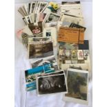 A collection of vintage postcards and greeting cards.