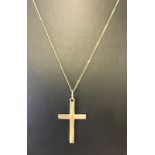 A 9ct gold cross and chain.