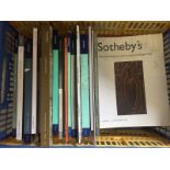 A box of Sotheby's Auction catalogues.