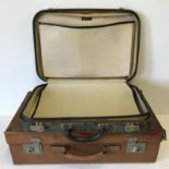 2 vintage suitcases.