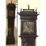 A walnut veneer long case clock by Rich, Wright and Witham.