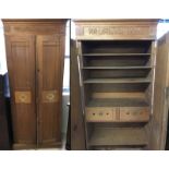 A vintage wooden advertising shop cigar cabinet.