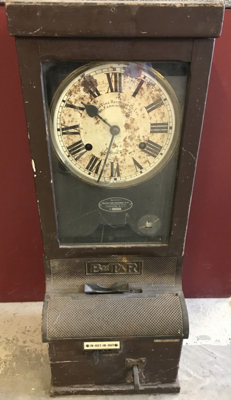 A vintage clocking-in machine by The British Time Recorder Co Ltd.