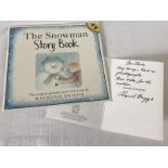 A signed copy of Raymond Briggs 'The Snowman Story Book', together with a signed Christmas card.