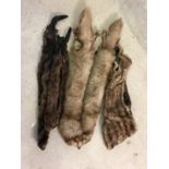 A collection of vintage fur stoles.