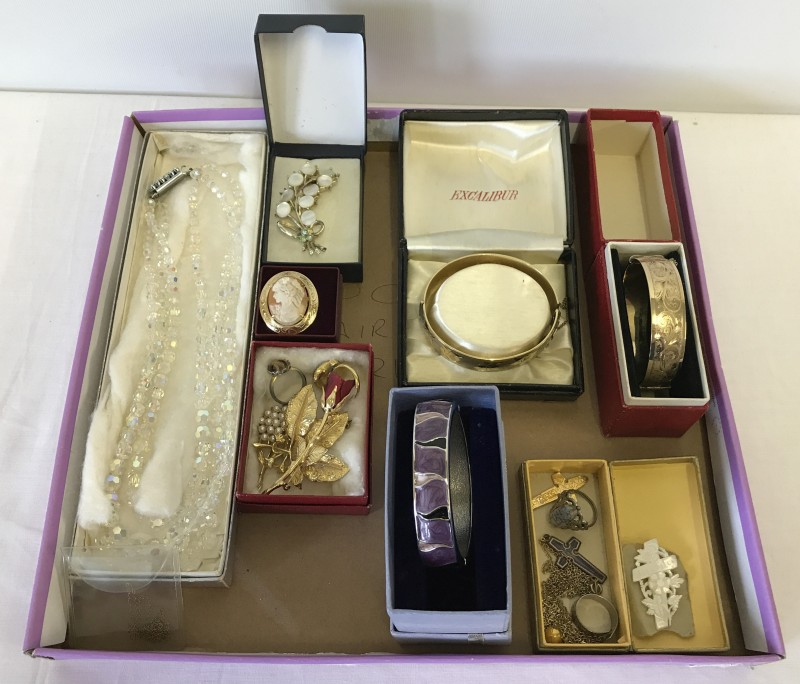 A collection of costume jewellery to include 2 good quality rolled gold hinged bangles.