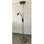 A modern brushed brass effect uplighter standard lamp with poseable spotlight.