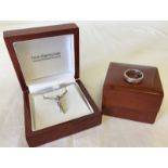 2 items of silver "Hot Diamonds" jewellery in original boxes.