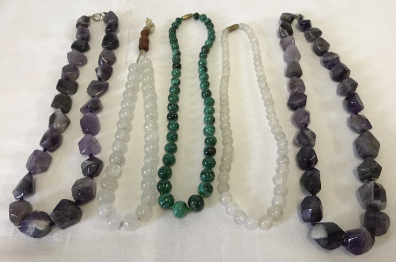 5 natural polished stone necklaces.