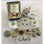 A collection of trinket/pill boxes.