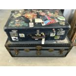 A large vintage metal cased luggage trunk with internal removeable shelf.