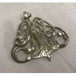 An Art Nouveau style 925 silver brooch set with clear heart shaped stone.