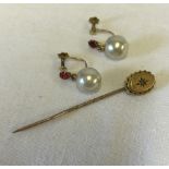 An antique 9ct gold & diamond stick pin, together with a pair of 9ct gold & faux pearl earrings.