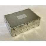 A hallmarked silver snuff / trinket box with hinged lid.