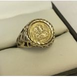 Hallmarked 9ct gold ring with pierced heart design to shoulders and mount.