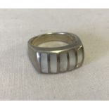 Heavy hallmarked silver ring with mother of pearl inlay.
