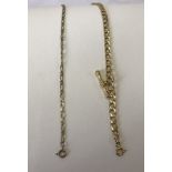 2 x 9ct gold 7" chains, one with suspended 'T' bar.