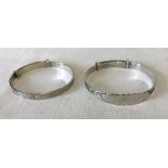 2 silver children's expandable christening bracelets.