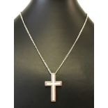 Heavy .925 silver cross with mother of pearl inlay.