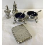 2 silver plate salts complete with blue liners and spoons.
