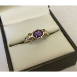 9ct gold ring set with an oval amethyst.