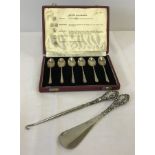 A cased set of 6 silver coffee spoons together with silver handled boot hook & shoe horn.