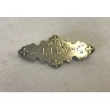 Antique silver bar brooch with the name Lily.
