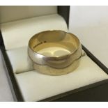 Very large hallmarked 9ct gold wedding band.