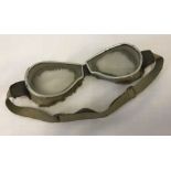 A vintage pair of motorcycle or flying goggles.