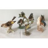 A collection of 4 Goebel bird figures to include a Nuthatch and a Siskin group.