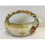 A Clarice Cliff, Newport Pottery Celtic Harvest basket shaped handled fruit bowl.