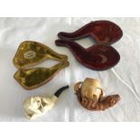 2 cased Meerschaum smoking pipes.