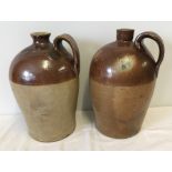 2 large stoneware flagons / handled bottles.