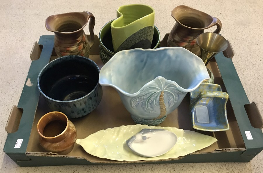 A box of assorted ceramics.