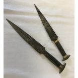 2 horn handled daggers.