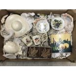 A box of assorted ceramics.