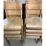 13 vintage wooden school chairs.