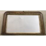 A satin wood framed mantle mirror.