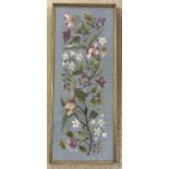 A framed and glazed silk embroidered panel.