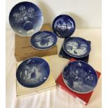 A collection of 6 Royal Copenhagen and Bing & Grondahl Christmas plates.