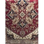 A new Heriz rug with red background.