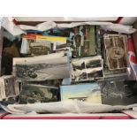 A box of vintage postcards from destinations around Britain dating from 1930's.